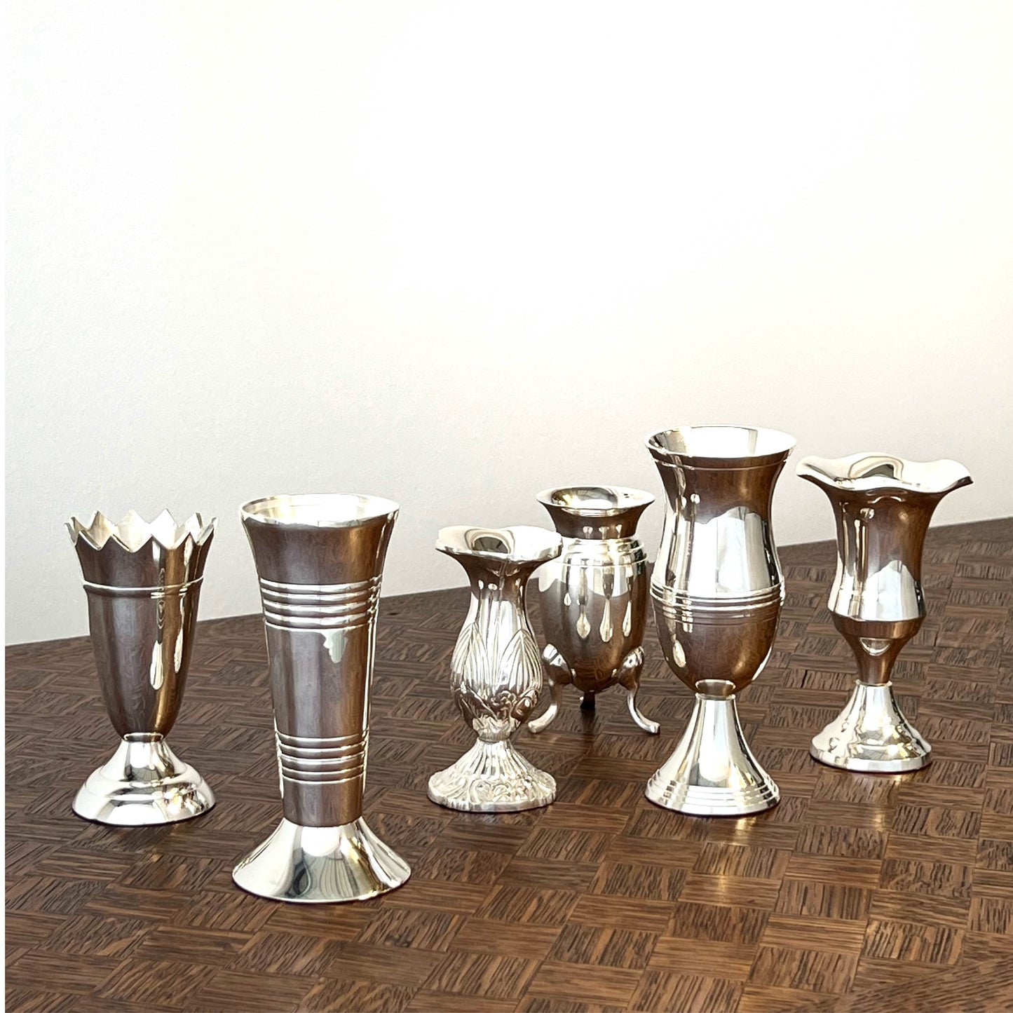 Collection of Queen Anne's Silver Vases