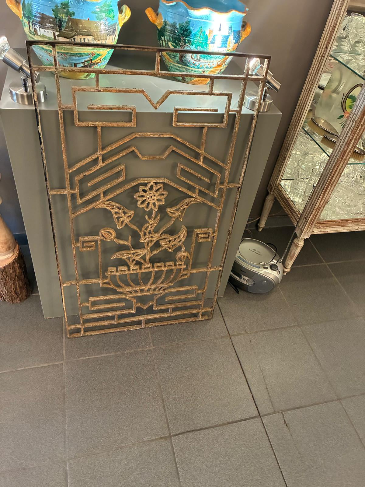 Vintage Iron Gate with Planted Sunflower